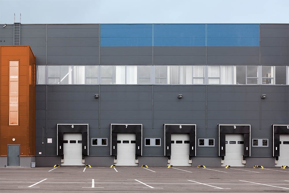 Modern truck loading bays with overhead doors